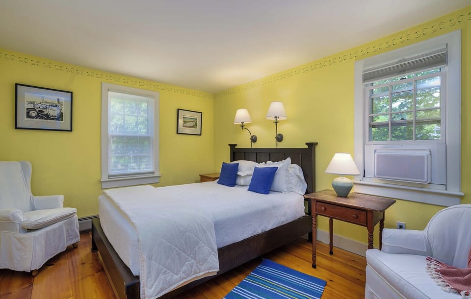 Upstairs back queen bedroom with view to backyard