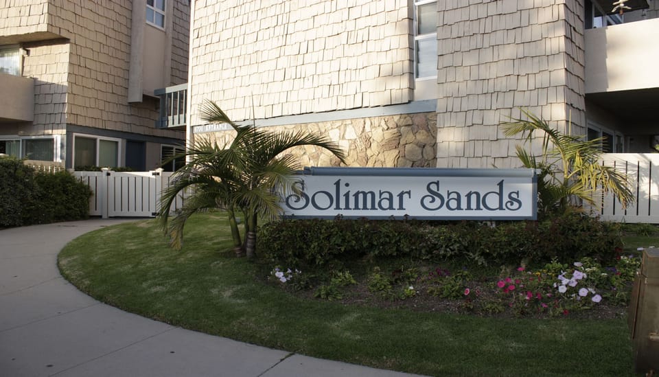 Main entrance to Solimar Sands Condo complex on beach road