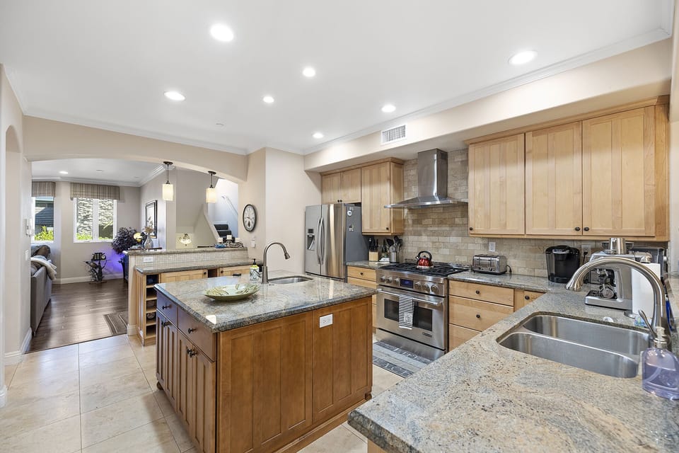 A separate island with a vegetable sink.