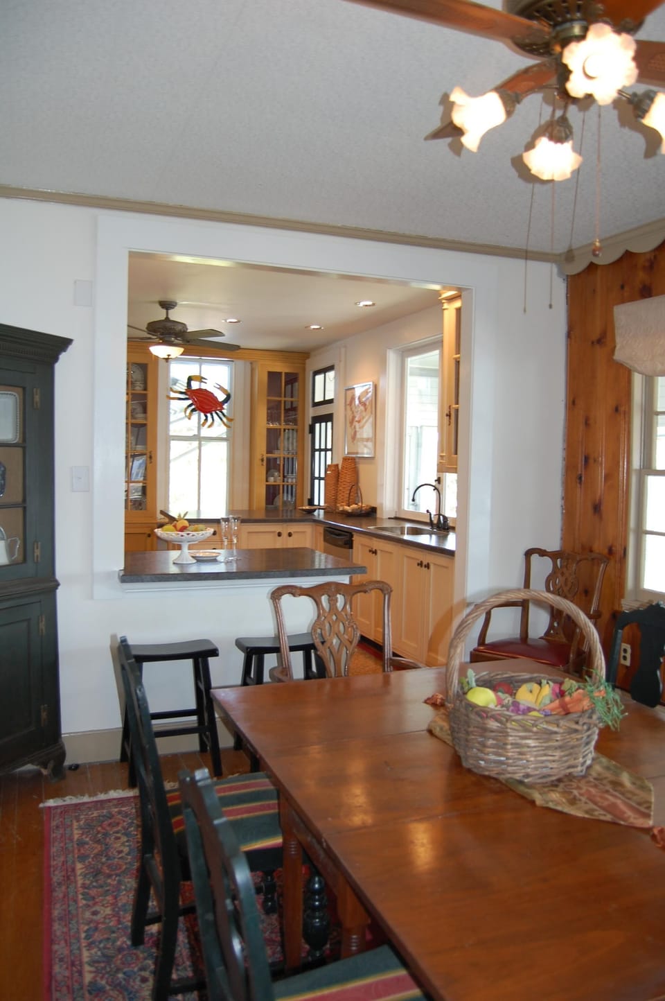A view of the dining room, connecting to the kitchen.