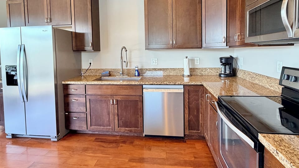 Kitchen with stainless steel appliances and beautiful granite countertops