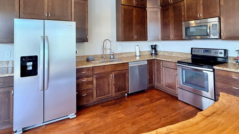 Kitchen with stainless steel appliances and beautiful granite countertops