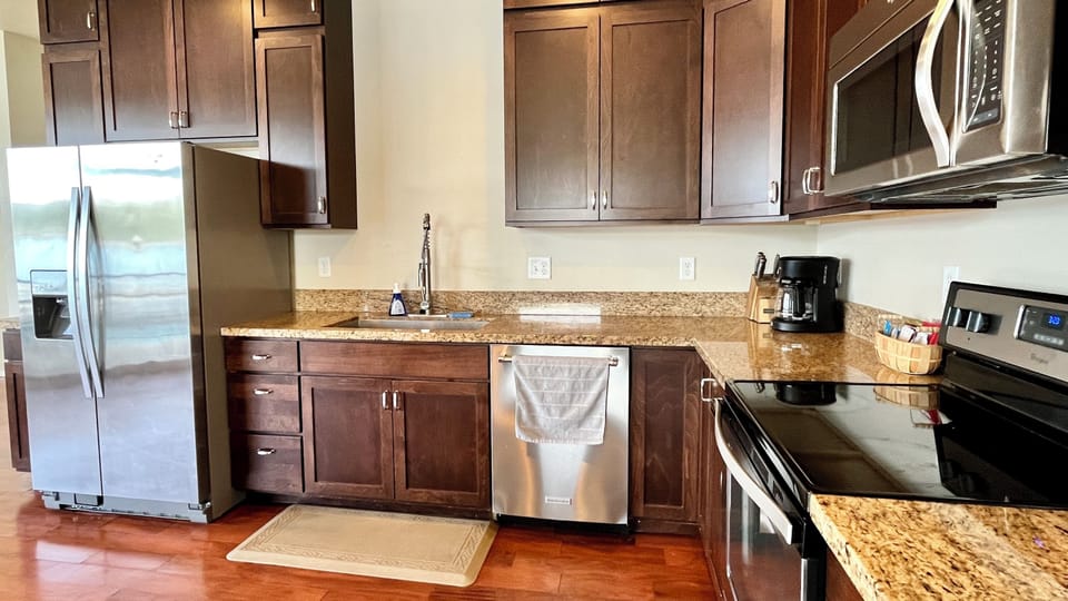 Kitchen with stainless steel appliances and beautiful granite countertops