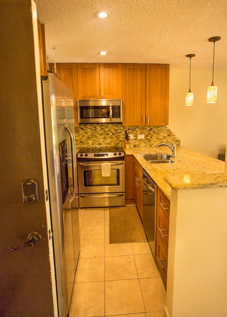Fully remodeled kitchen with new stainless appliances.