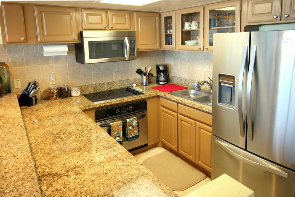 Spacious Kitchen, refrigerator with icemaker.
