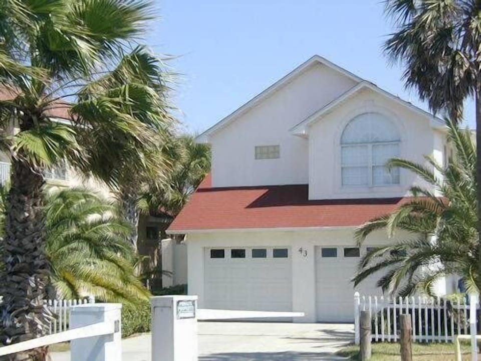 Front of house with 2 car garage. 