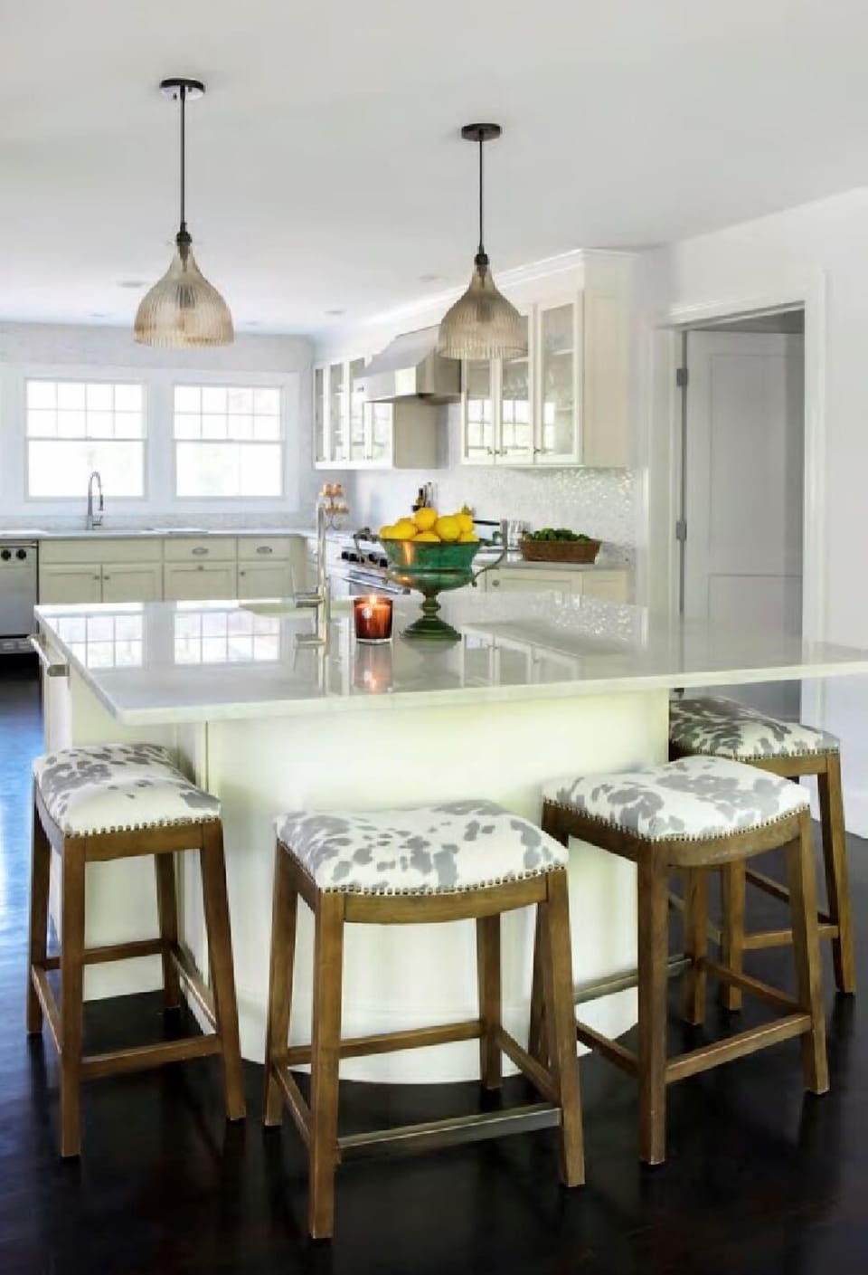 kitchen area with stools 