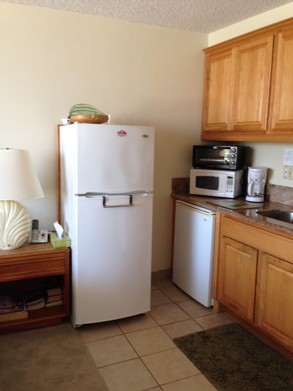 Full size fridge plus mini fridge for drinks.