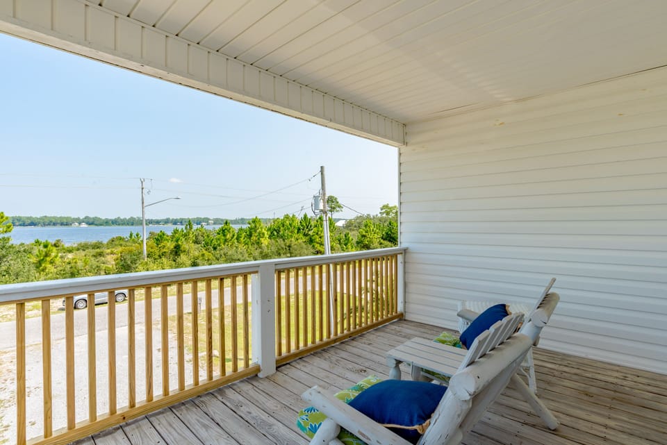 balcony off king primary suite with view of lagoon, grab your coffee and book