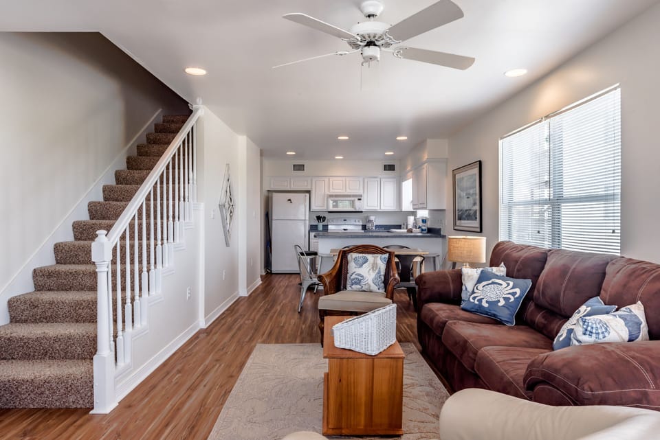 Stairs lead up to master suite, laundry and bunkbed room with ensuite bath