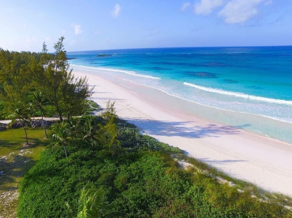 View to Casuarina Bay from French Leave pink sand - 5 mins walk south
