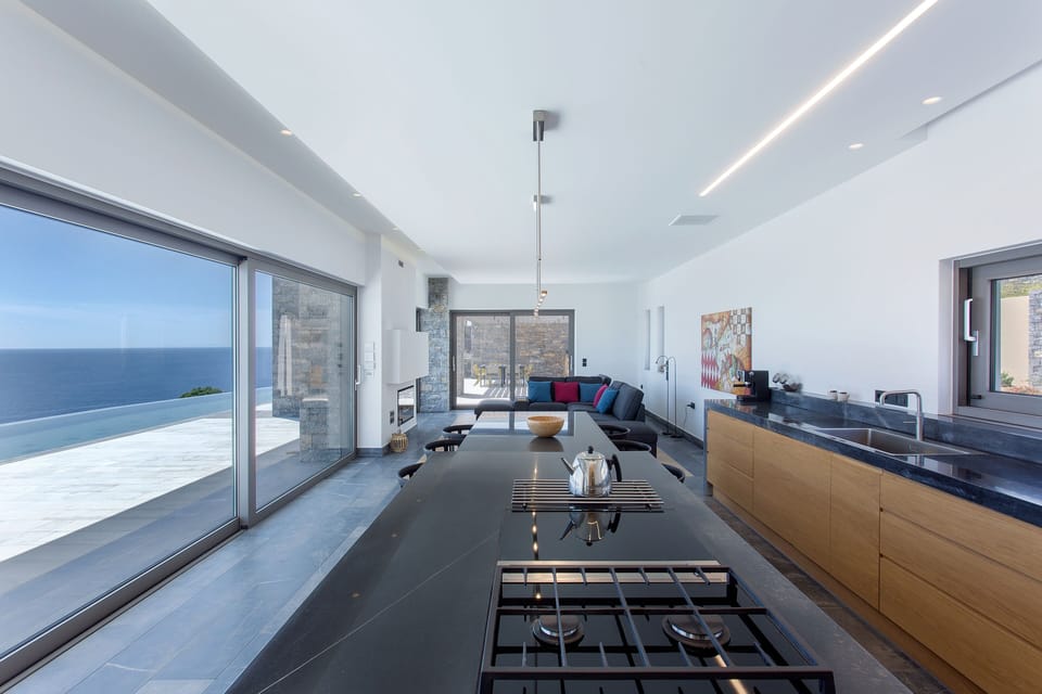 Contemporary kitchen with Bora downdraftsystem to keep the amazing views!