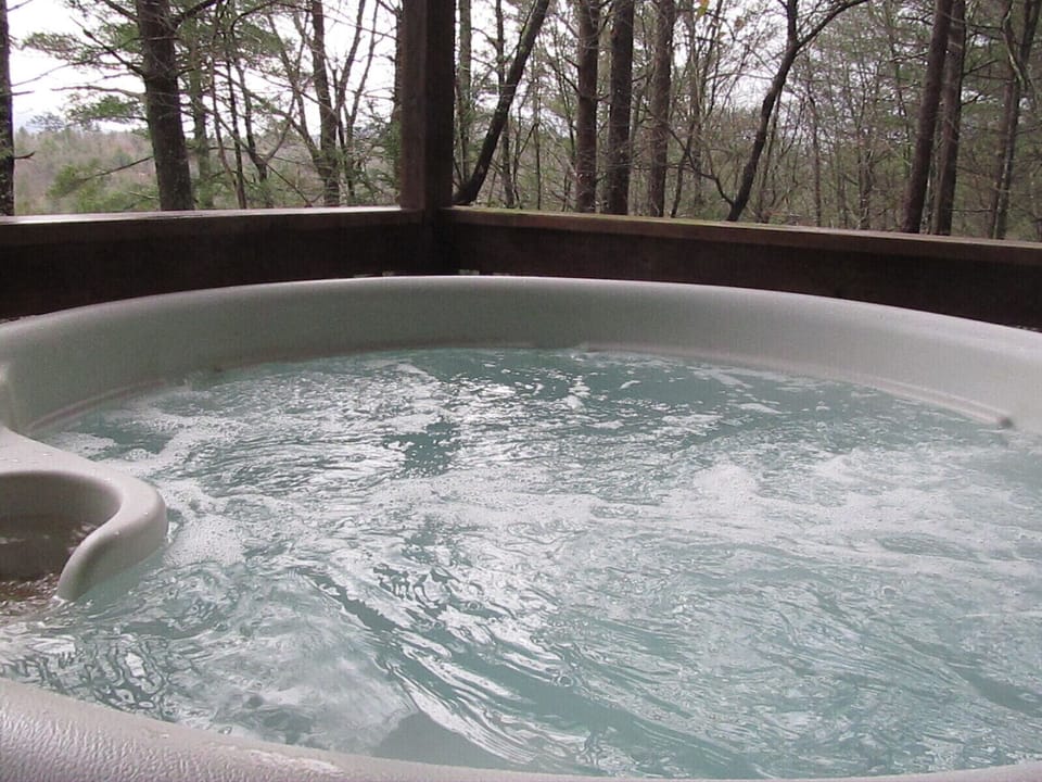 Relax in the 6 person hot tub and enjoy the view