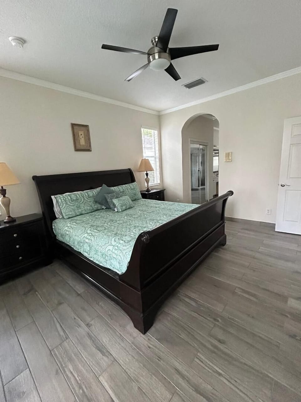 Downstairs King Master bedroom with ensuite with roman tub and separate shower