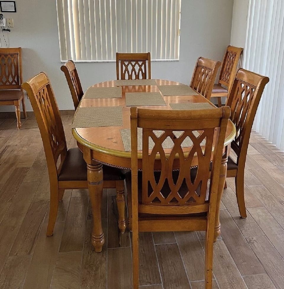 Dining table set up for six - with seating for 8