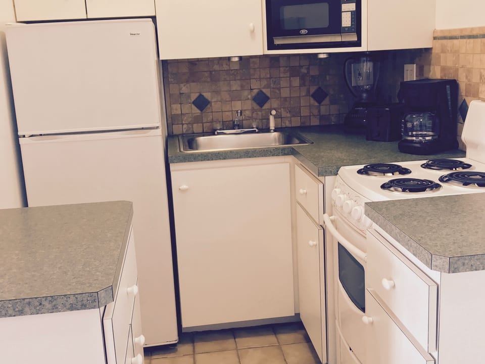 Kitchen complete with small appliances, pans, dishes, 1 roll paper towels