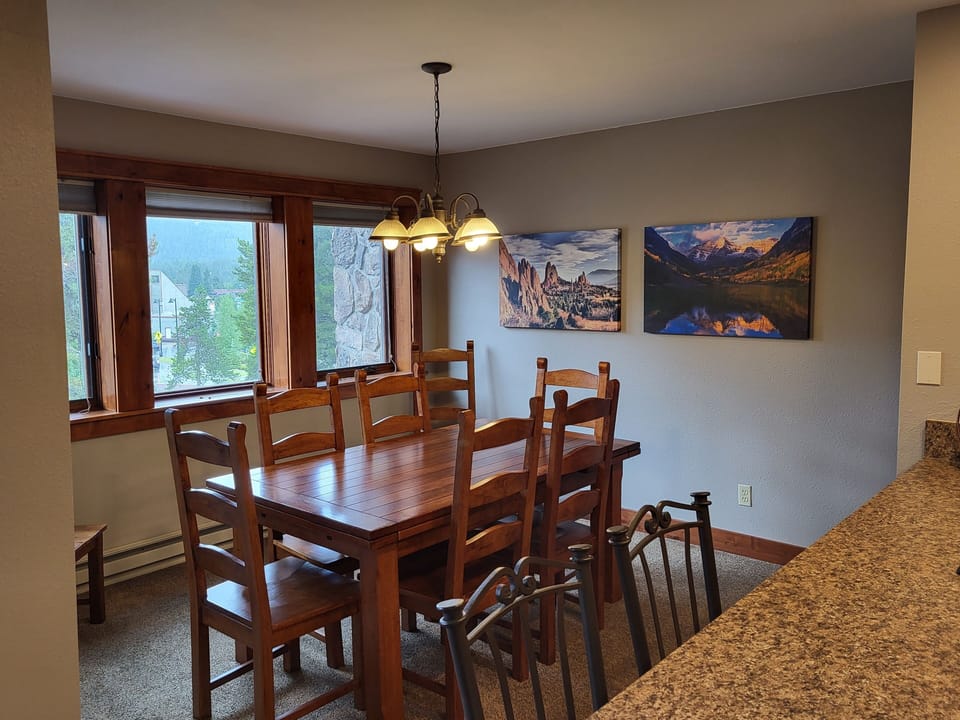 Dinning room table extends to seat 8.