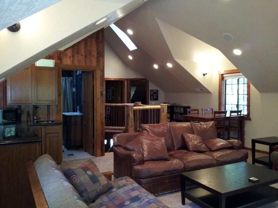 Upstairs media room with massive, 70" brand new TV and surround sound.