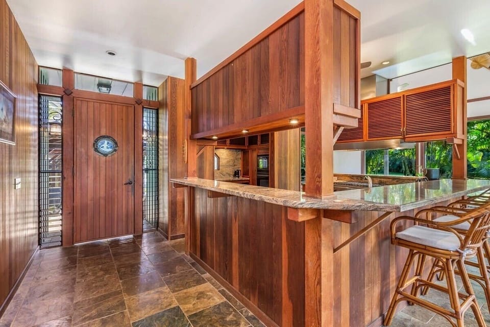 Entry View from Kitchen wrap-around Bar Counter