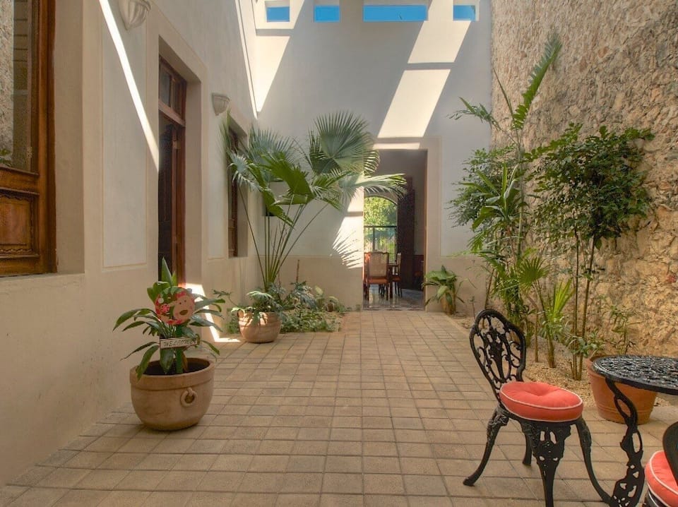 The central courtyard brings light and breezes into the entire house