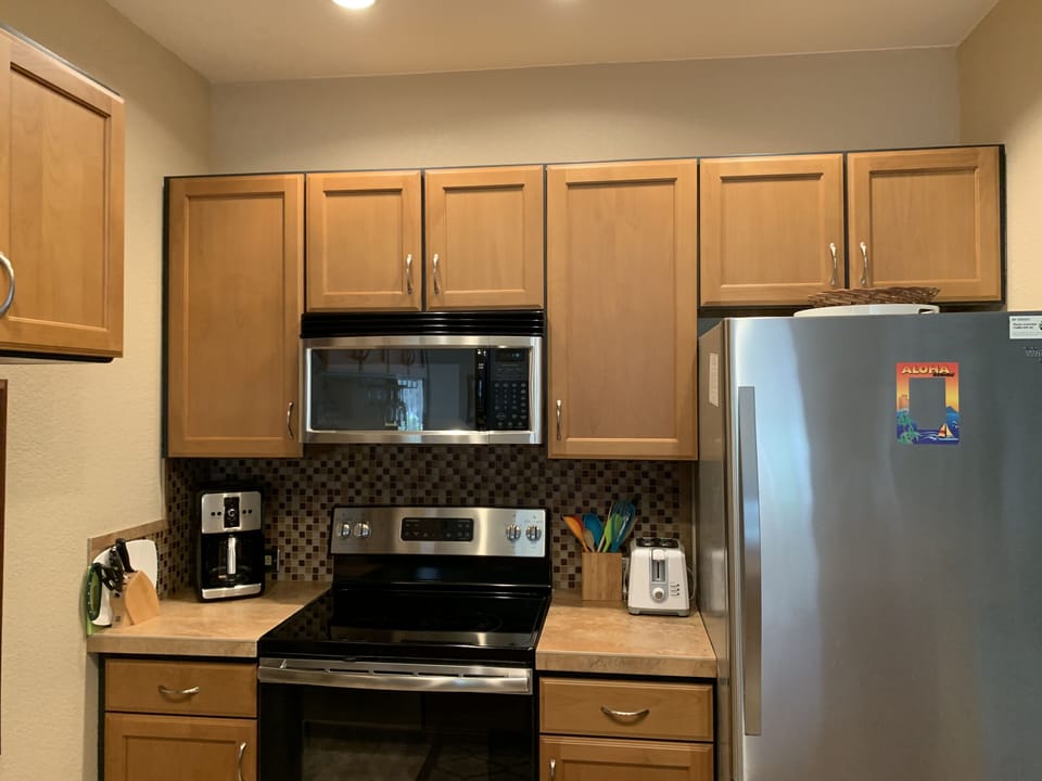 stove, dishwasher, microwave, full size fridge with ice maker