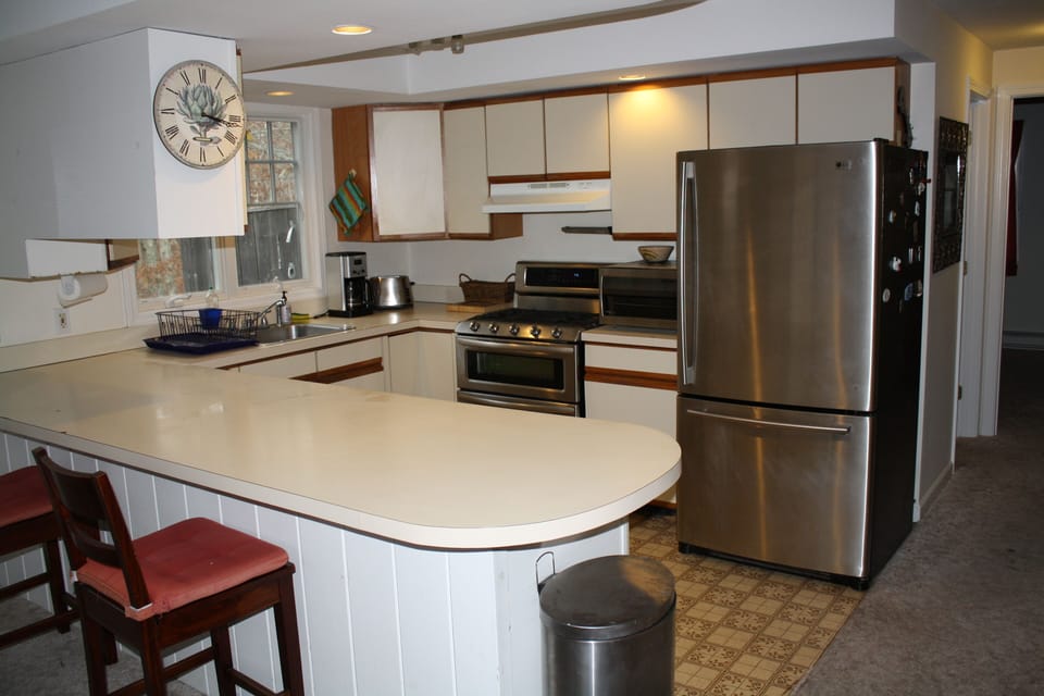 All stainless steel appliances including new gas range with 2 electric ovens