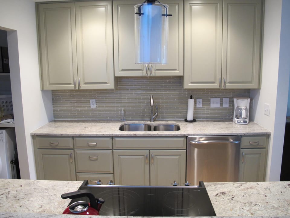 glass tile kitchen backsplash,  glass cooktop range