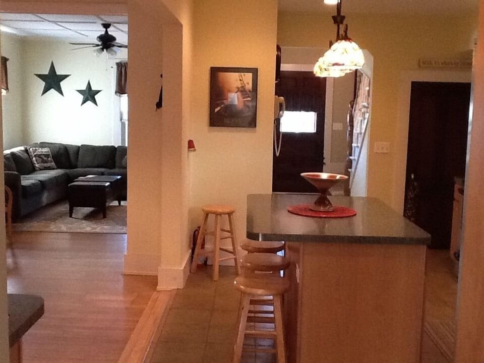 Open floor plan to living room and dining room