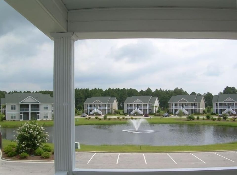 Beautiful View from Front Covered Porch.  Several Free Parking Spaces.