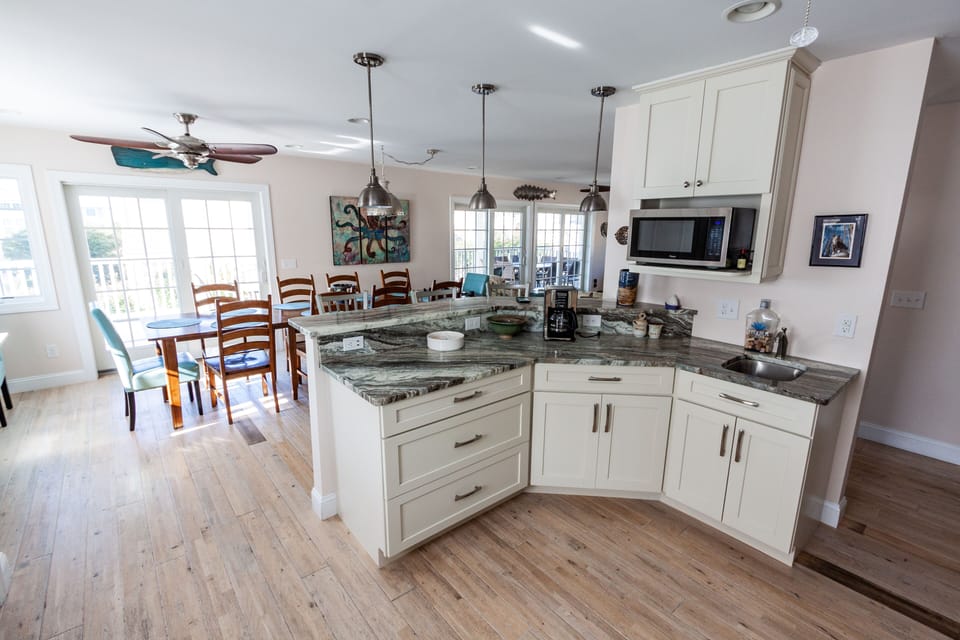 Kitchen has seats for 15 counting the bar stools 