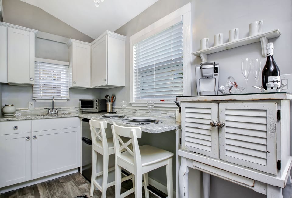 Your convenience kitchen with coffee/wine bar in the foreground.