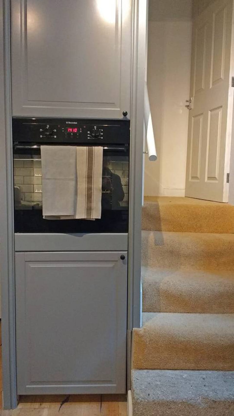 kitchen showing stairs to first floor
