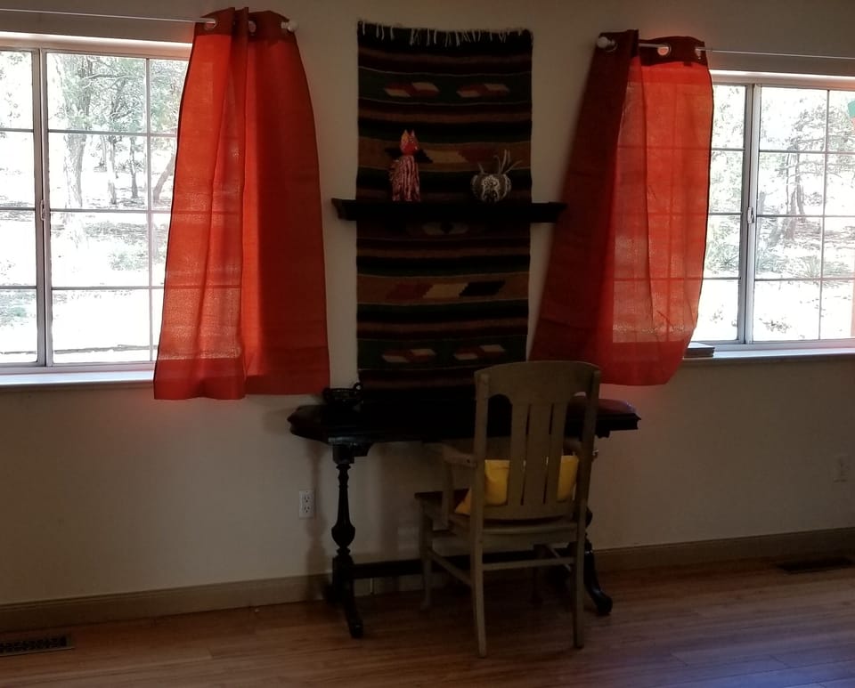 Dining Room has Full View into back 2 Acers & space for small desk
