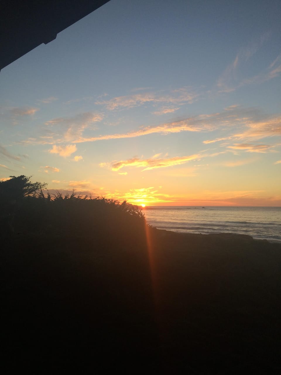 Sunset from oceanside balcony