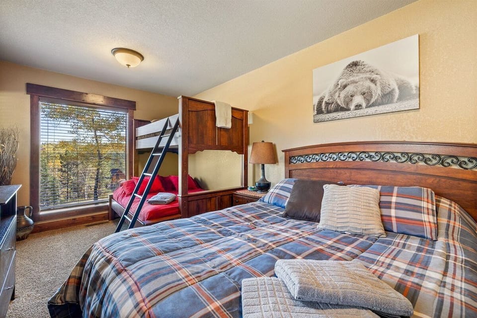 Lower level bedroom 4 with queen bed, full/twin bunk
