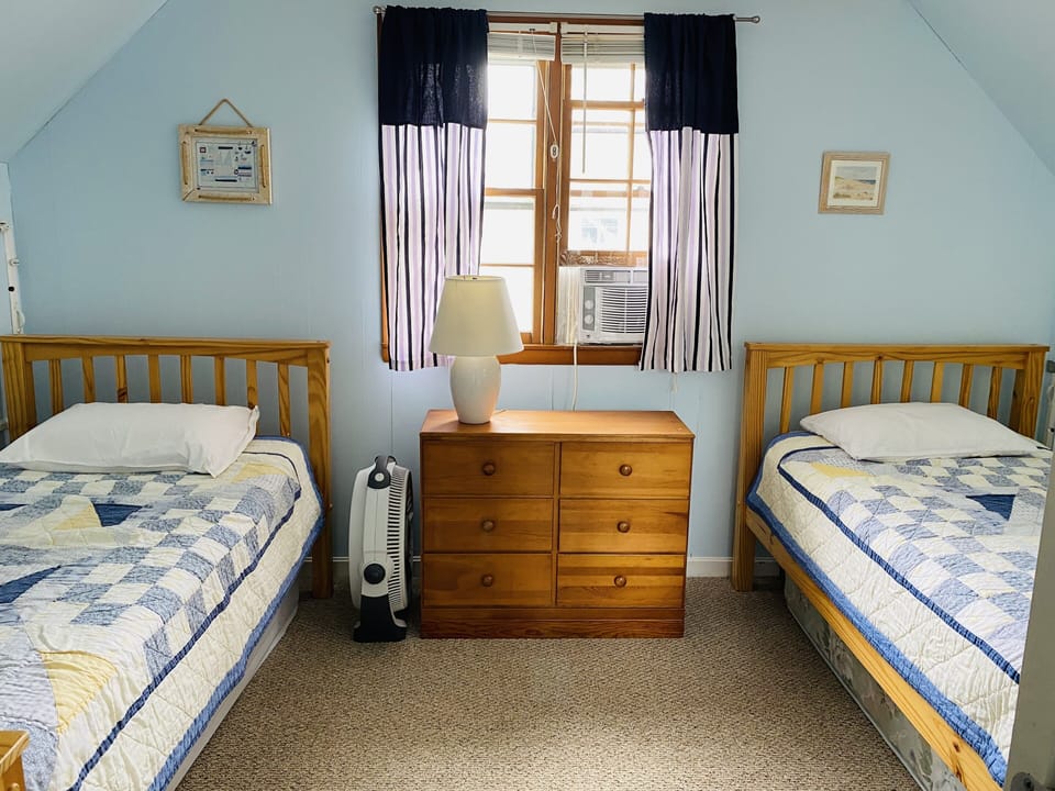 Second floor bedroom 3 with 1 twin and 1 queen and air conditioner 