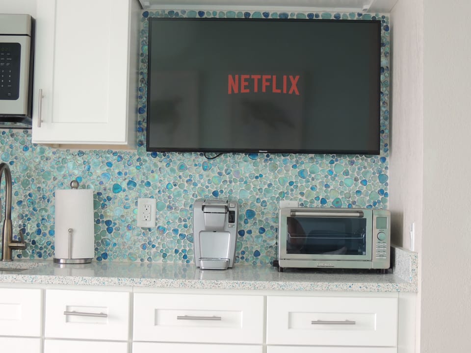 Smart TVs in the kitchen and bedroom