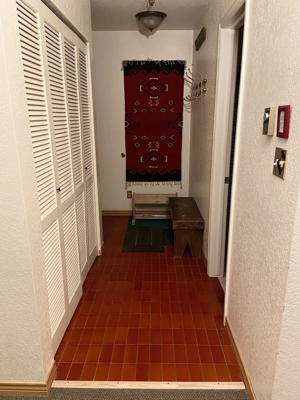 Slope-side entrance with ski rack