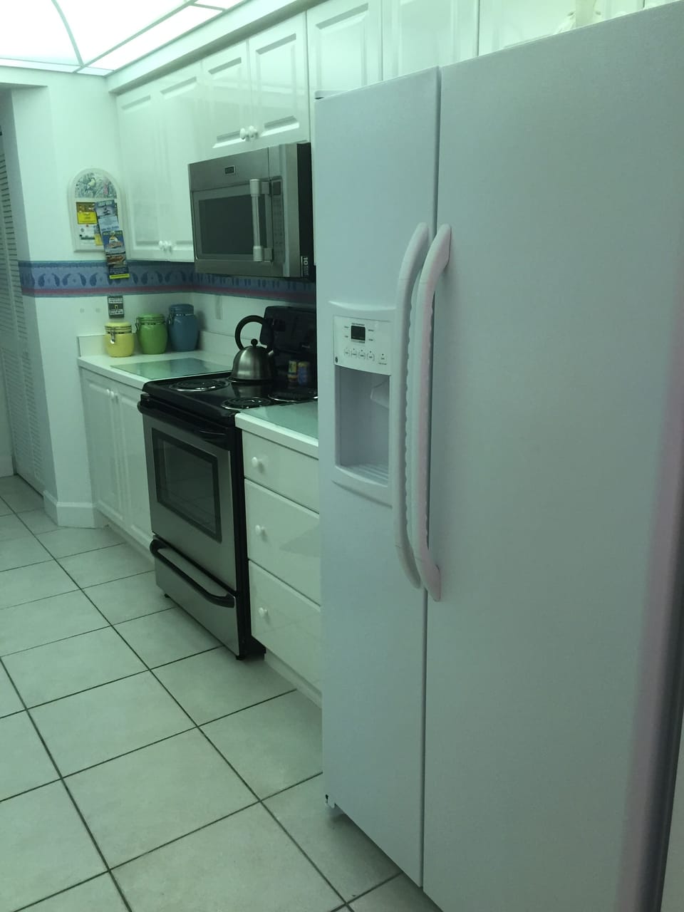 Kitchen: stove, microwave refridgerator