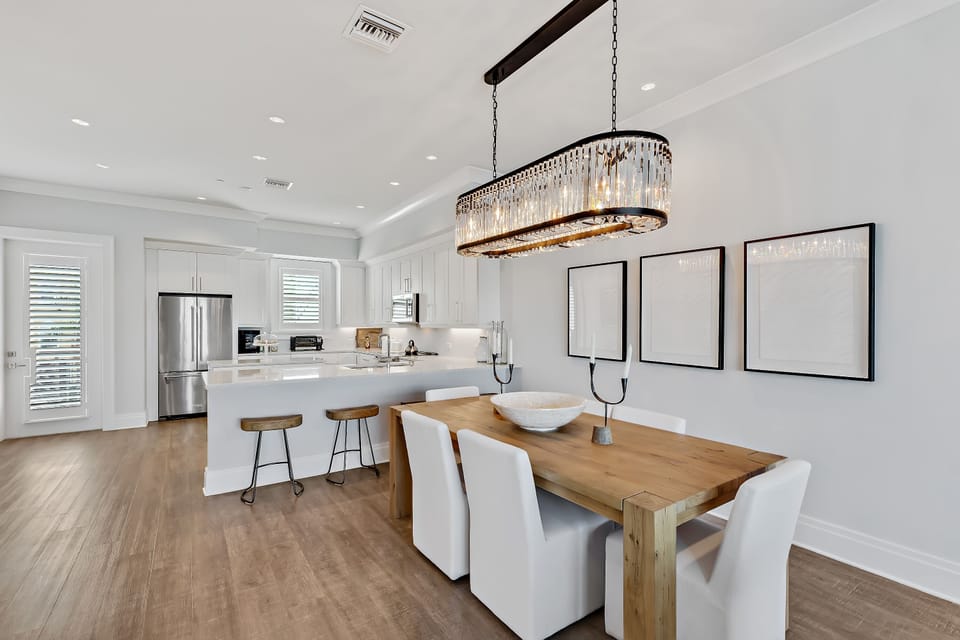 Large open concept dining area. Plus breakfast bar with 4 barstools.