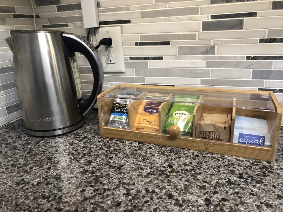 Tea and hot water kettle provided. 