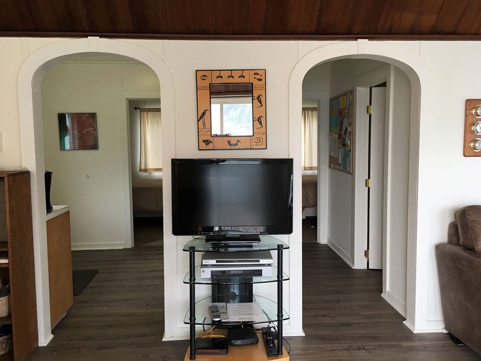 The Flatscreen TV.  The bedrooms are at the end of each hall.