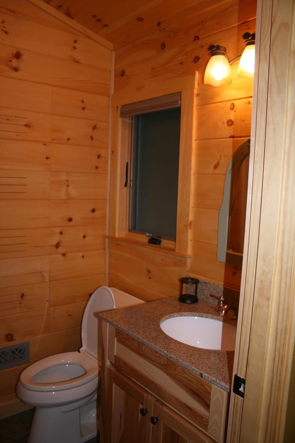 View of the bathroom in bunkhouse.  It is a full bathroom with shower.