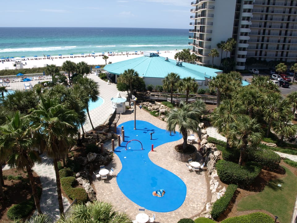 Kids' Splash Pad is adjacent to the lagoon pool as is Ocean's Restaurant