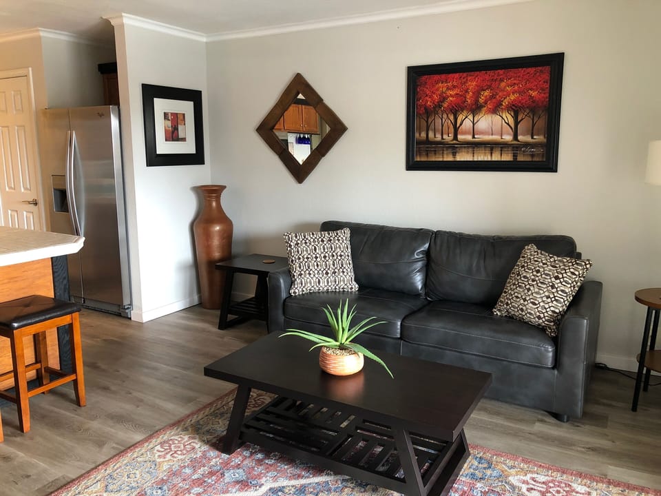 Modern decor with leather sofa-sleeper.