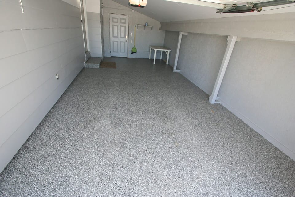 Professionally done $1,400 Epoxy Floor. Room for Bikes etc.