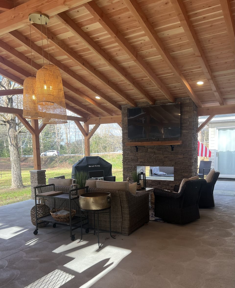Smart tv above double sided gas fireplace. 