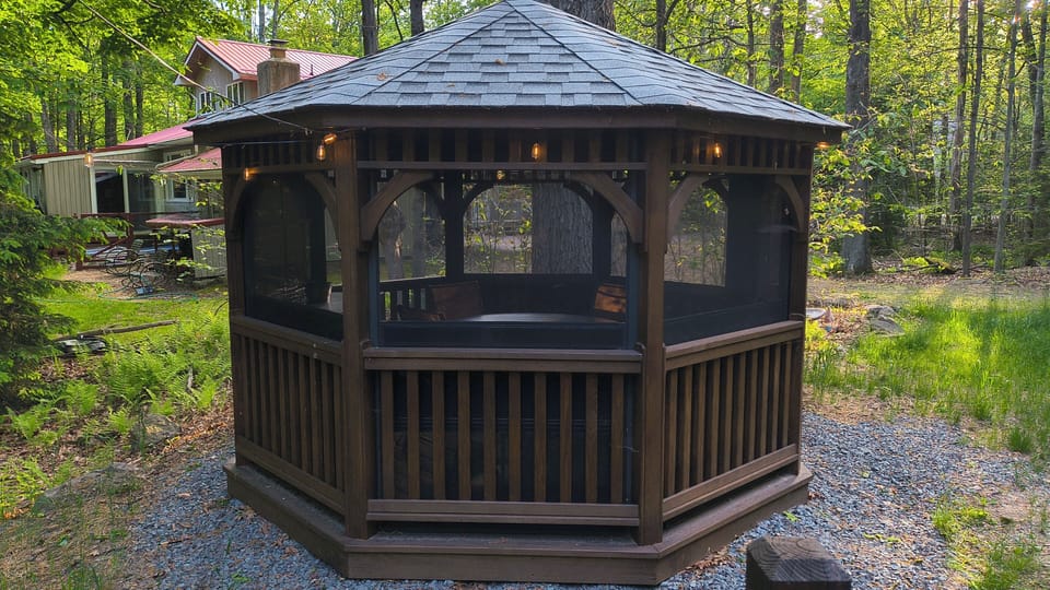New screened-in gazebo provides a bug-free space to enjoy the outdoors