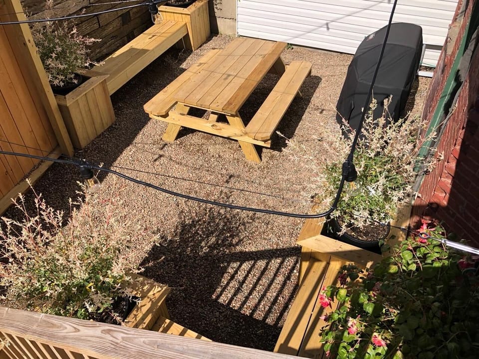View of the courtyard from above with the gas grill