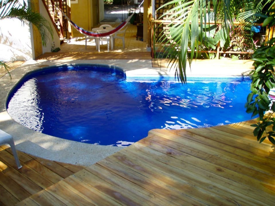 The pool is just steps away, stays cool and has sofa style seating.